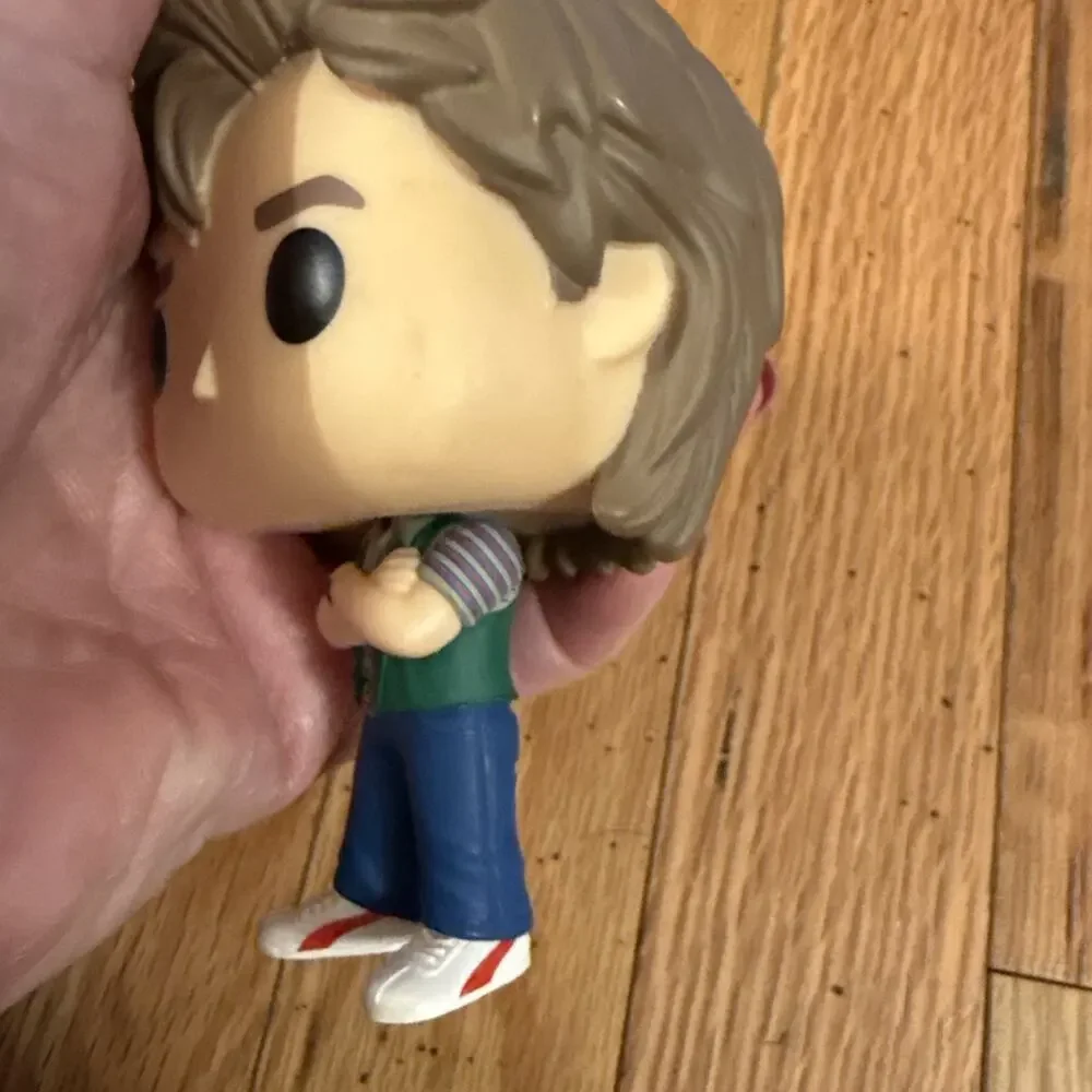 Funko Pop! Figure with Brown Hair, Cream Face, Green Vest, Blue Pants - Picture 3 of 7